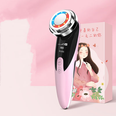 Pink skin rejuvenation beauty device with LED light rings and control buttons against a pink floral box