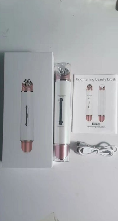 Heated eye massager with brightening beauty brush and USB charging cable from My Store