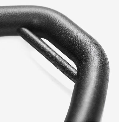 Close-up view of black ring fitness equipment for home with textured grip handle